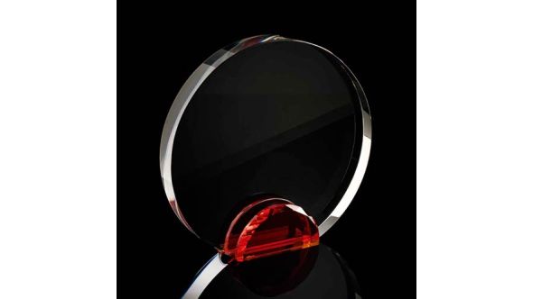 Large optical crystal round award with red crystal facet stand